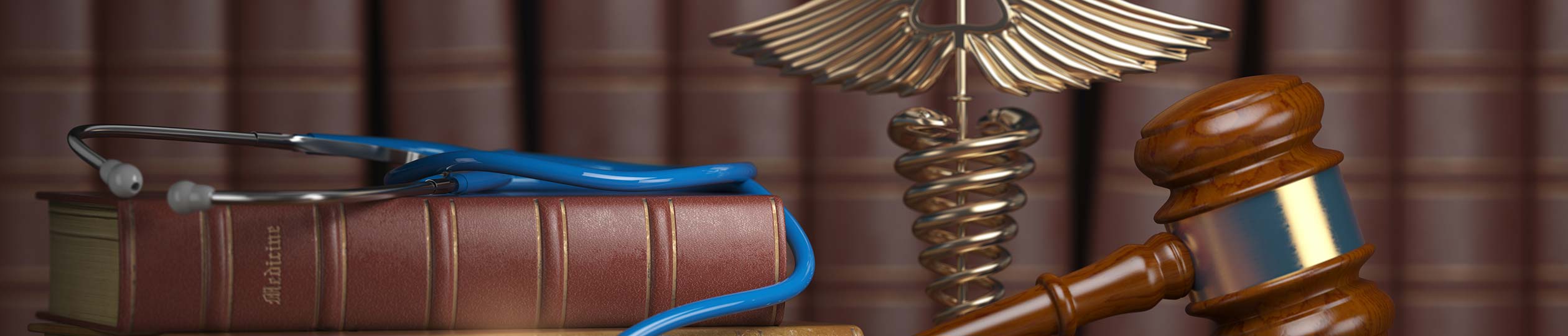 An image of a gavel and a book of medicine